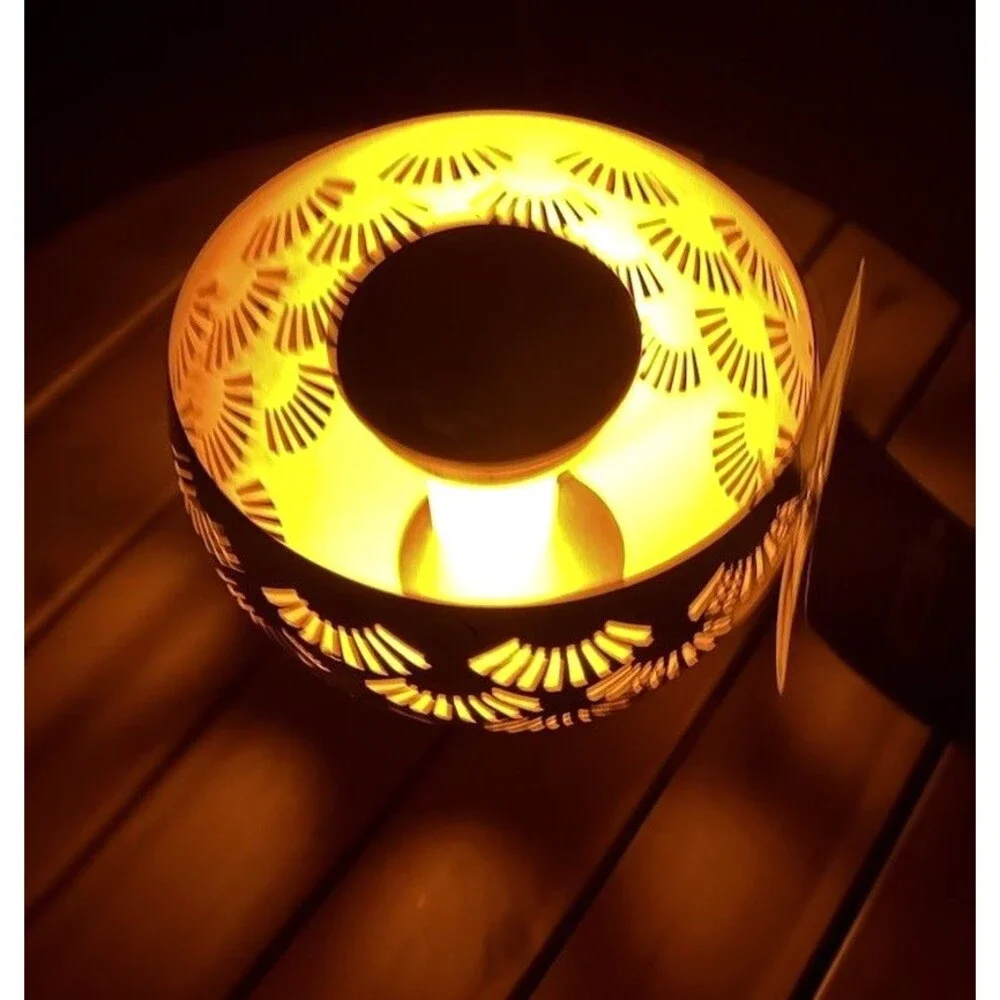 A Home Decor Solar Metal LED Flame Table Lamp Cutout Outdoor Lantern⁠